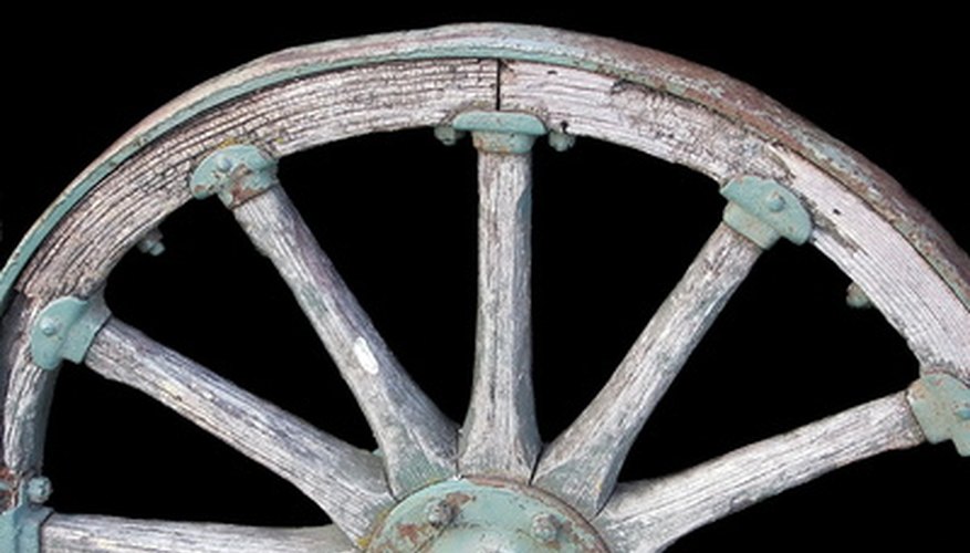 Center caps were placed on wagon wheels to protect the wooden axles from the elements of nature and dirt roads.