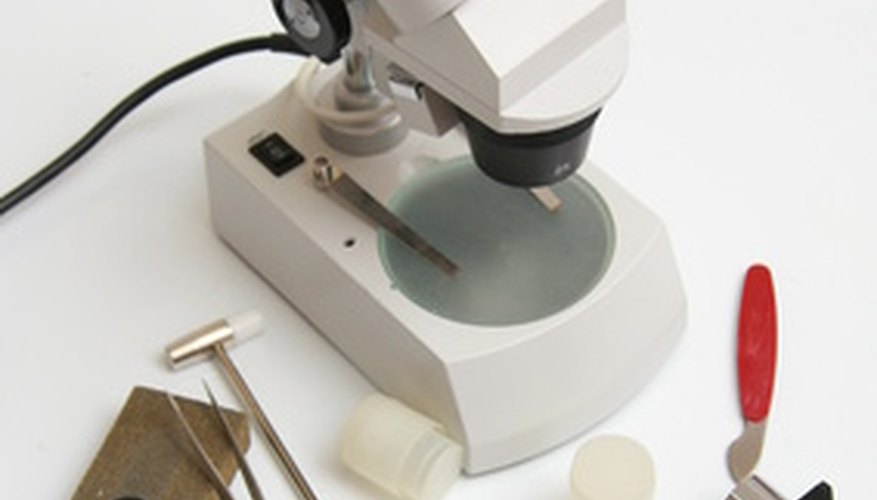 Notice the microscope stage with clips.