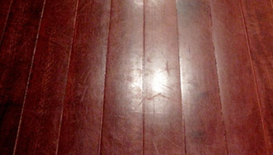 Use acrylic floor paint on wood floors.