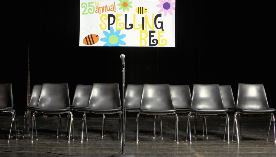 A stage is set up for a spelling bee competition.