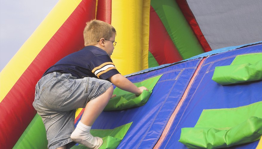 A boy is completing an obstacle course.