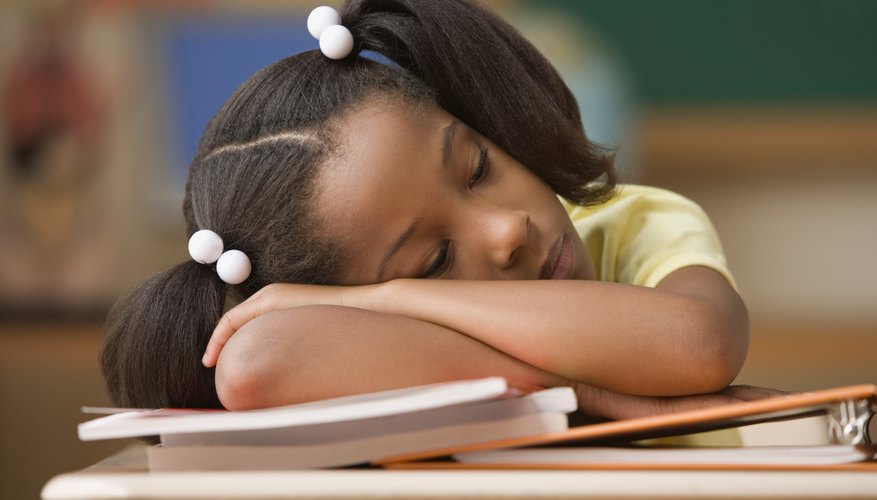 A long school day can lead to sleepiness and fatigue.
