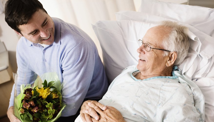 Tell your loved one that it is okay for him to go and that you'll be okay.