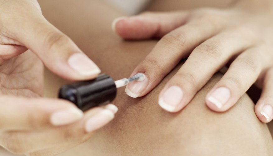 Extend the life of your design by applying a base coat before you paint your nails.