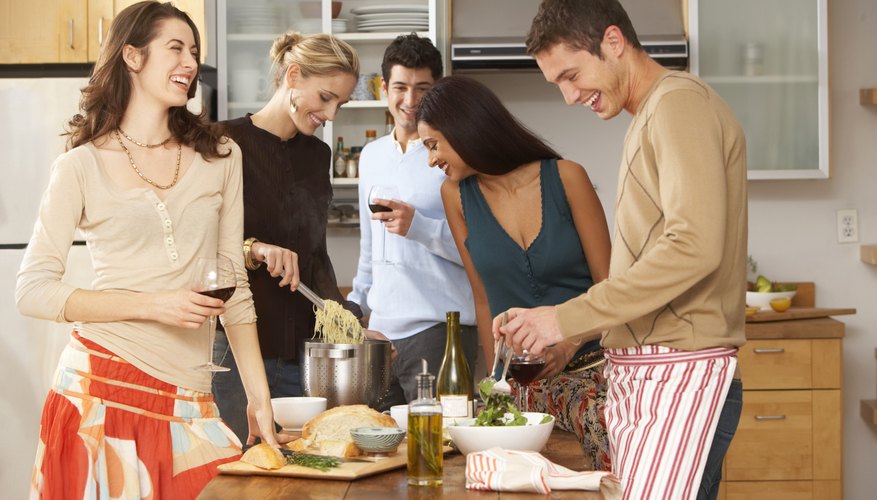Cook a gourmet meal with your friends and share it with a glass of wine.