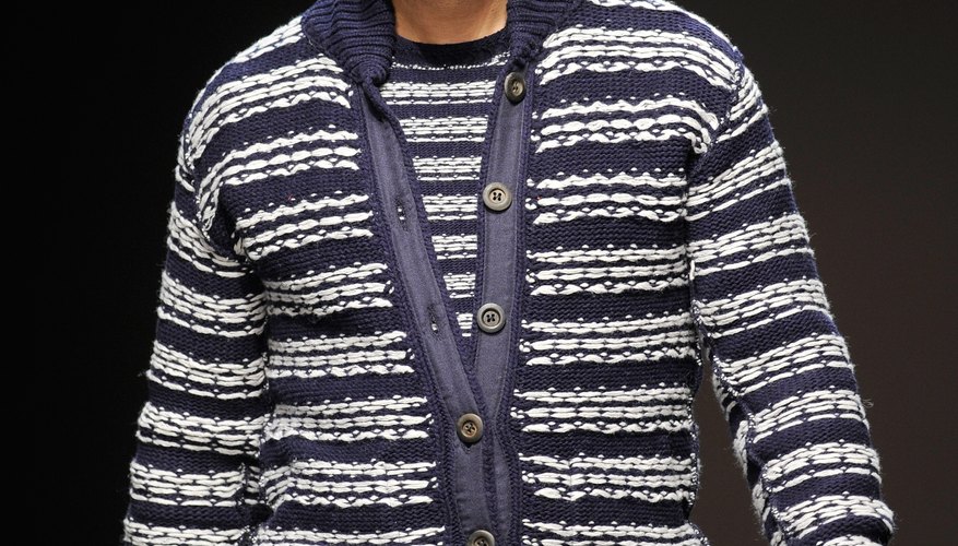 Pair your striped campus cardigan with a modern accessory like a fedora to give it a funky look.