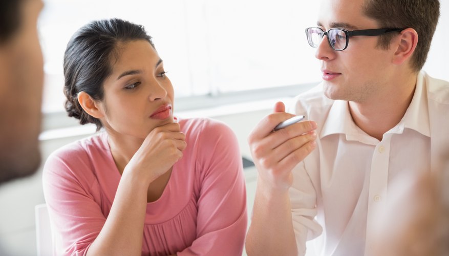 co-workers interacting with each other