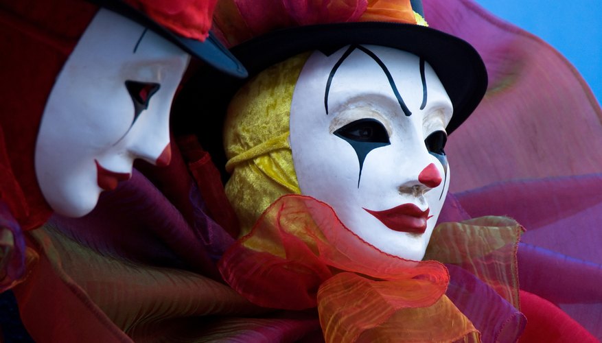 Close-up of men in harlequin costume
