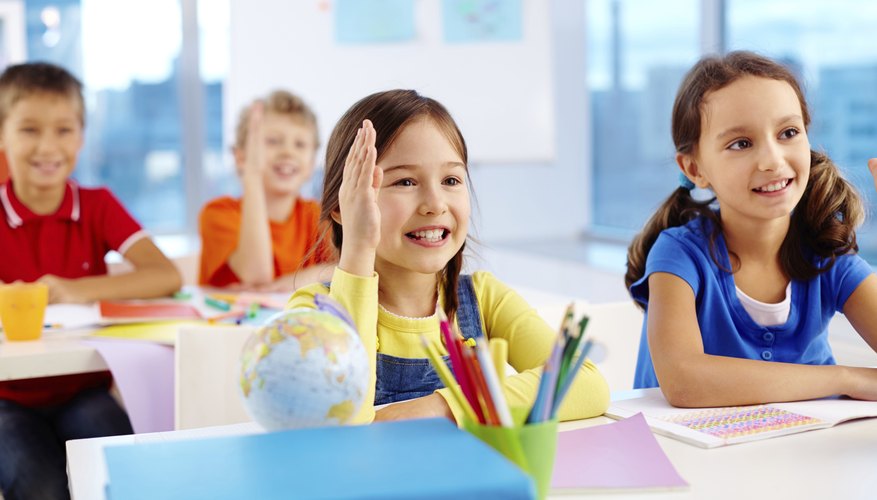 Students sitting at desk in classroom