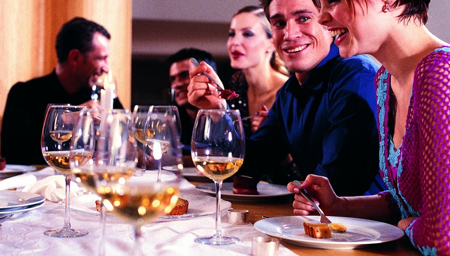 Experts agree that it would be better to reduce the guest list or food options than ask guests to pay (See Ref. 1,2).