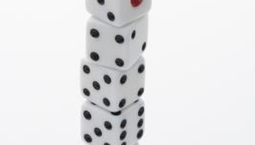 Challenge Yahtzee uses dice like these to play a Poker-like game.