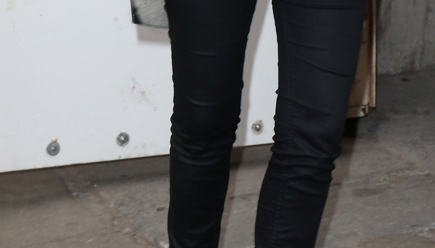 Whether in your top or your accessories, jewel tones play well with black jeans.