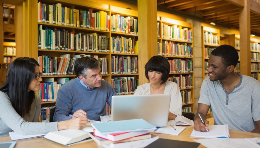 College students studying in a library