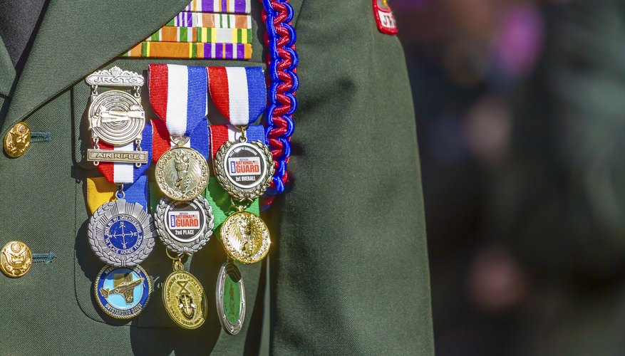 Close-up of medals on uniform