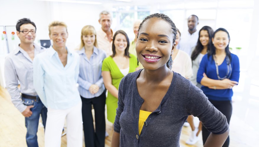Colleagues of different cultures working productively together may be one benefit of cultural pluralism.
