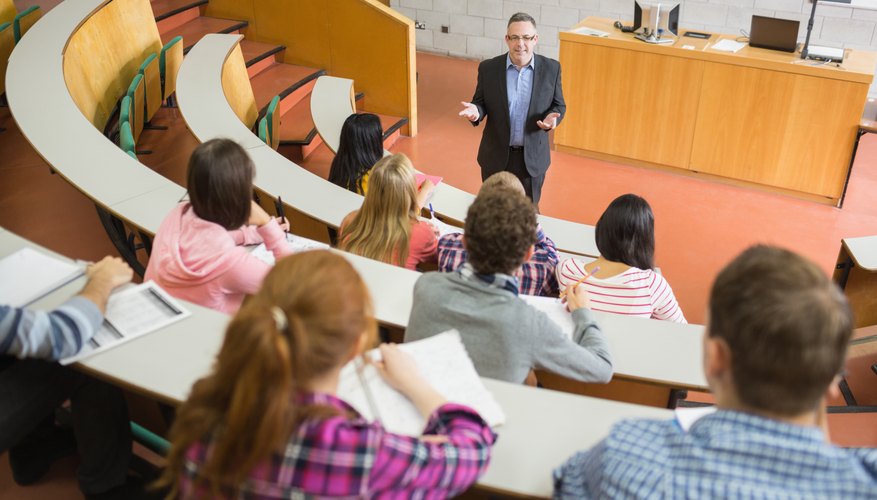 Students sitting in lecture hall.