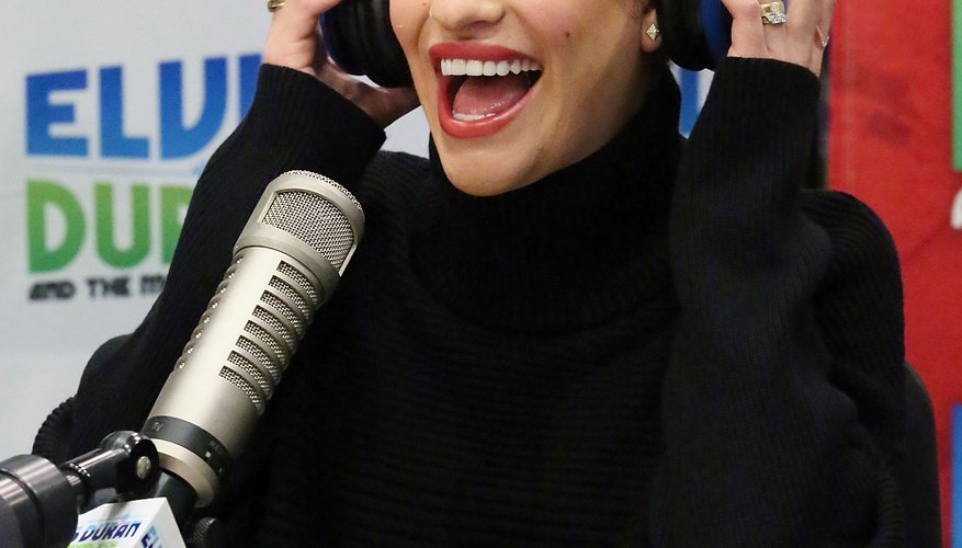 Leah Michelle lets out a big smile in her piecey look while at New York's Z100 Radio.