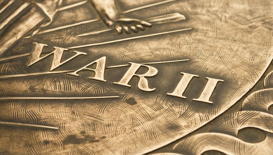 Don't worry about removing every bit of patina; concentrate on the flat and raised surfaces.