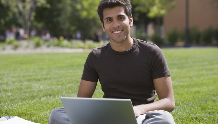 Student working on his laptop.