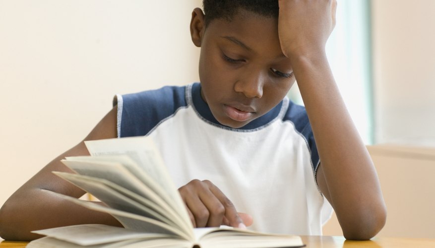 Boy reading book
