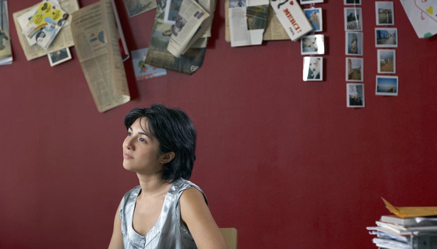 Add newspaper clippings to your photo board.