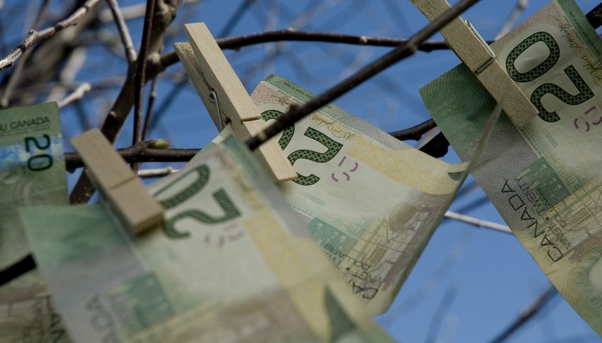 Place an small undecorated Christmas tree on a table and encourage people to pin money to the tree.