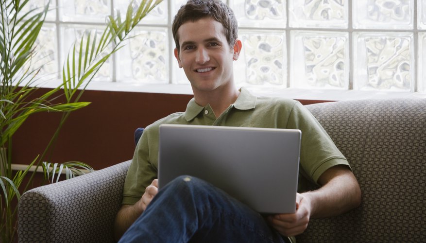 Student working on laptop.