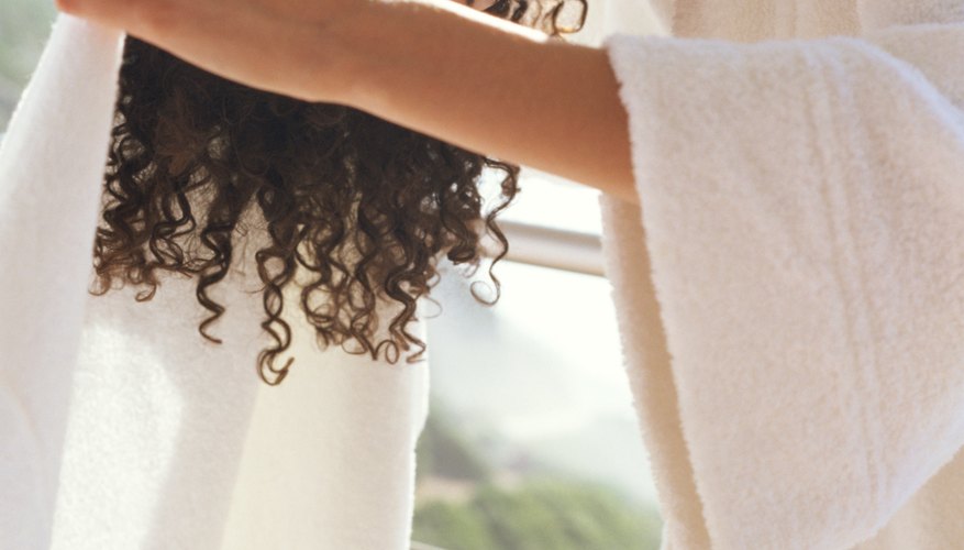 Blot, don't rub, your hair dry with a towel.
