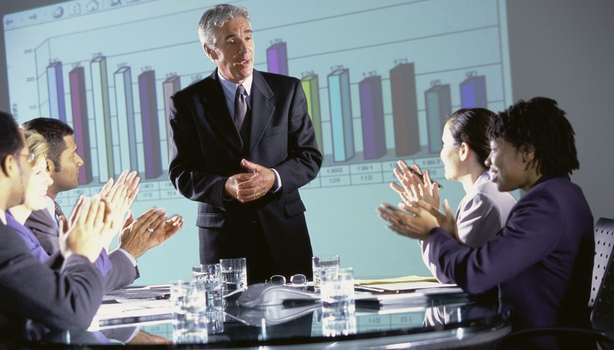 A businessman is giving a presentation.
