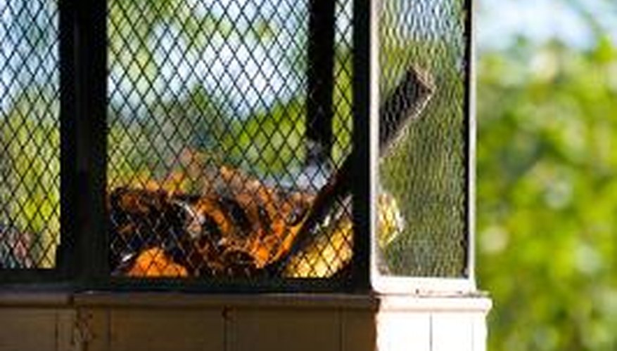 Place citronella oil lamps inside a fire pit to repel insects.