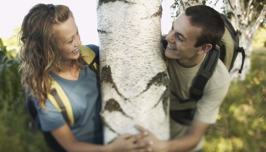 He enjoys flirting with her when he knows he won't be rejected.
