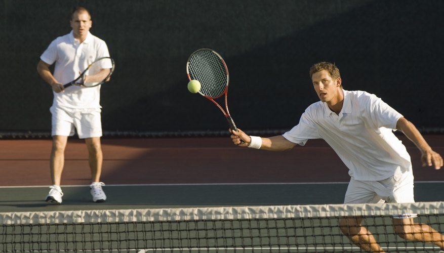 Two tennis players on the court.