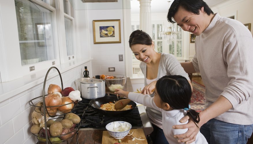 Chinese family making dinner