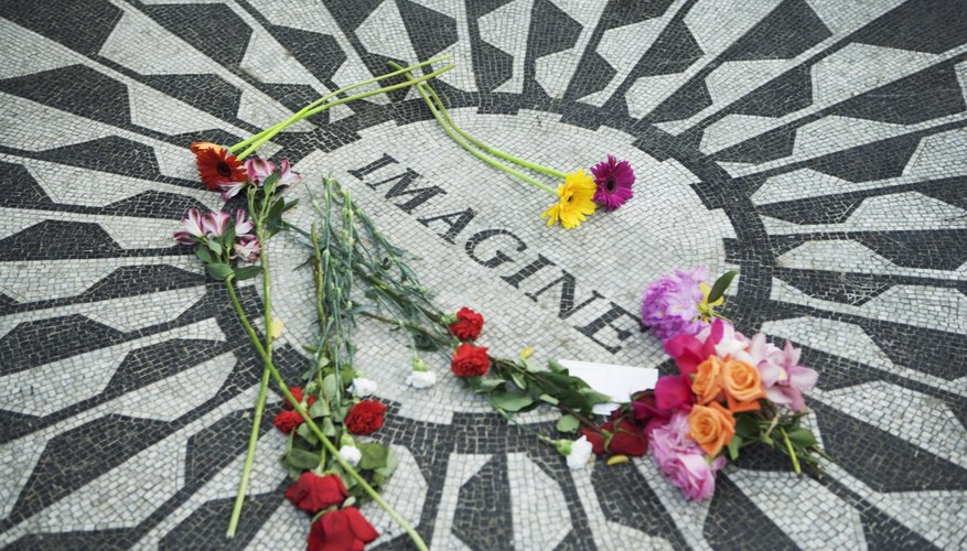 The John Lennon memorial in Central Park is located right by the location where he was shot.