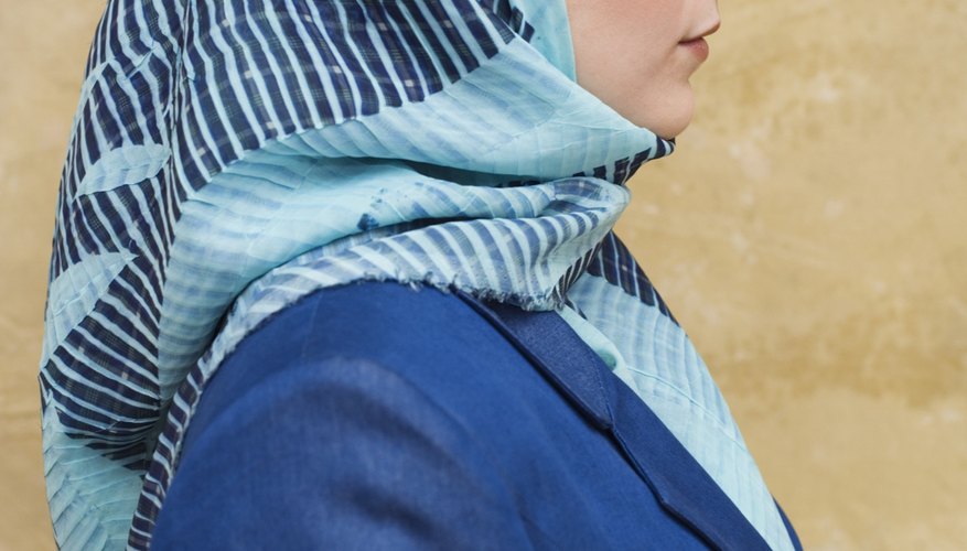 It is common for conservative Muslim women to cover their heads with a scarf.