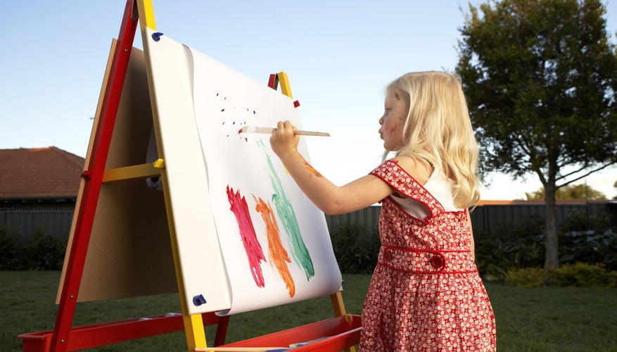 Children landscape painting outside