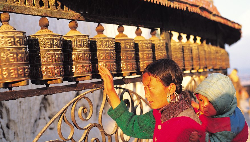 Tibetan Buddhists spin prayer wheels as a form of prayer, to accumulate merit and wisdom.