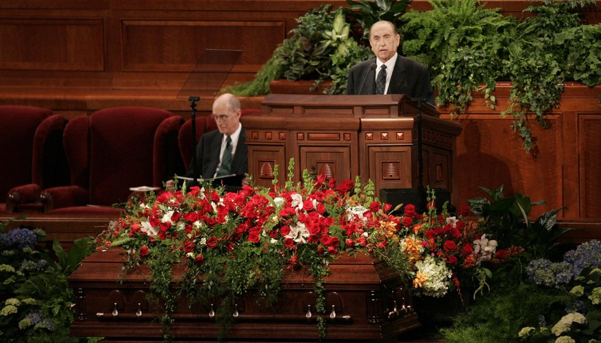 Mormon Church President Thomas S. Monson speaks at a funeral.
