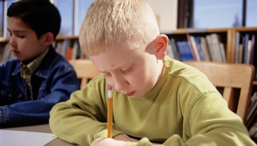 In third grade, paragraph writing should focus on developing a clear topic.