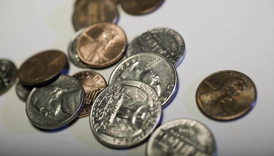 It is not unusual to find coins on the headstones of soldiers, such as these at Arlington National Cemetery.