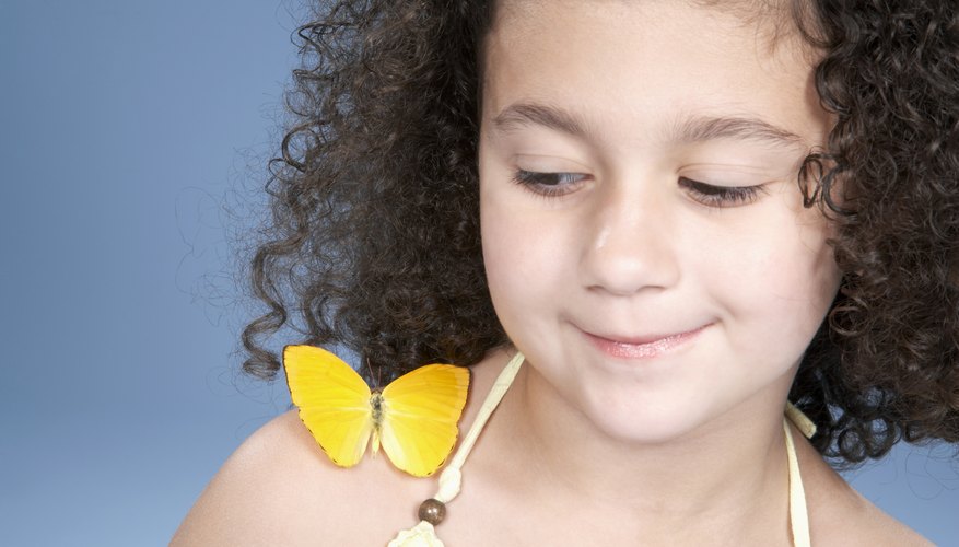 Young girl with butterfly.