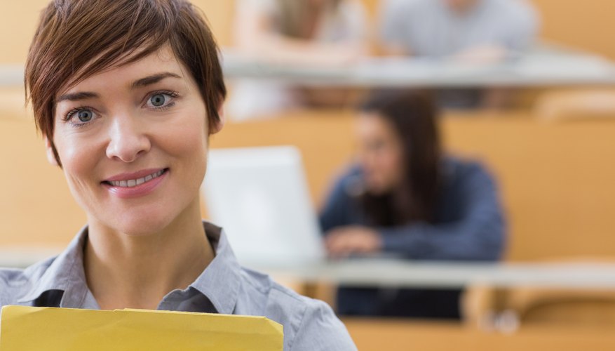 Close-up of graduate student with laptop