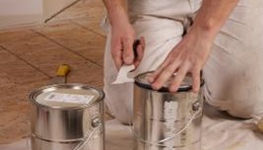A good acrylic or alkyd primer-sealer will seal water-based paints.