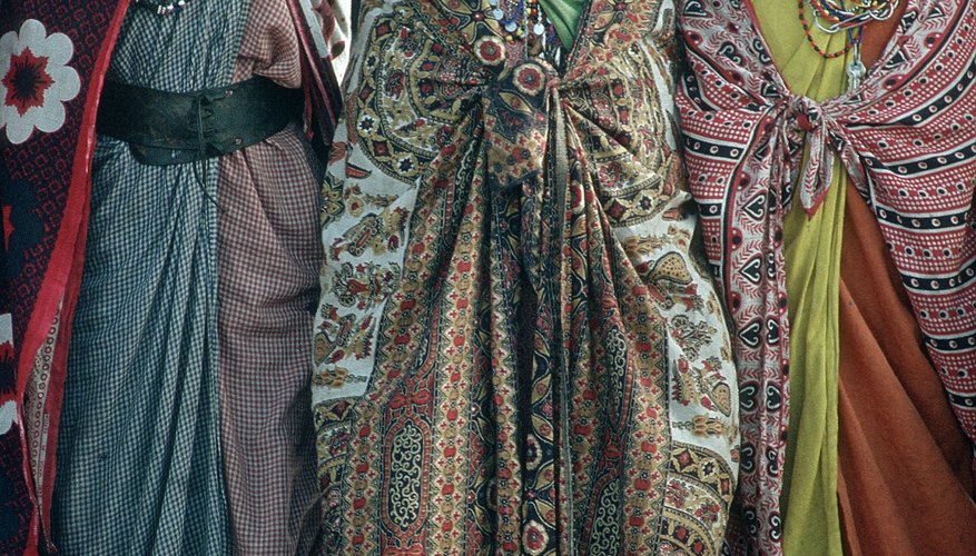 Bantus, like these women in traditional clothing, mixed with Arab traders in Kenya to create the Swahili people and language.