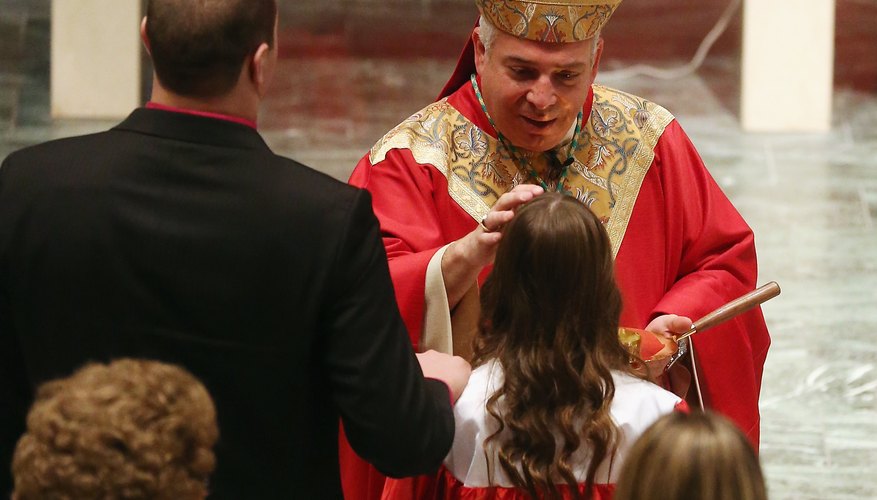 Baptismal promises are renewed by youth receiving the sacrament of Confirmation.