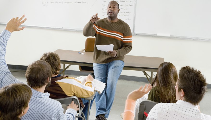 Professor giving lecture in college classroom.