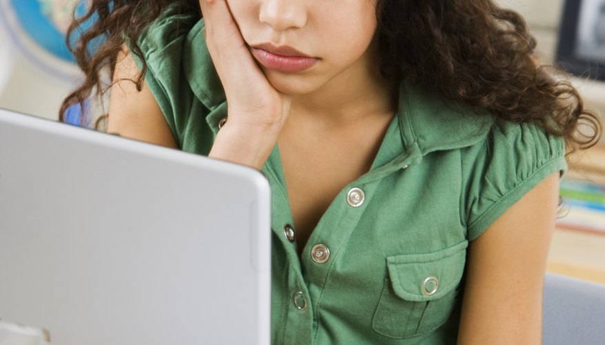 You can use Gmail's filter system to send annoying emails directly to the Trash.