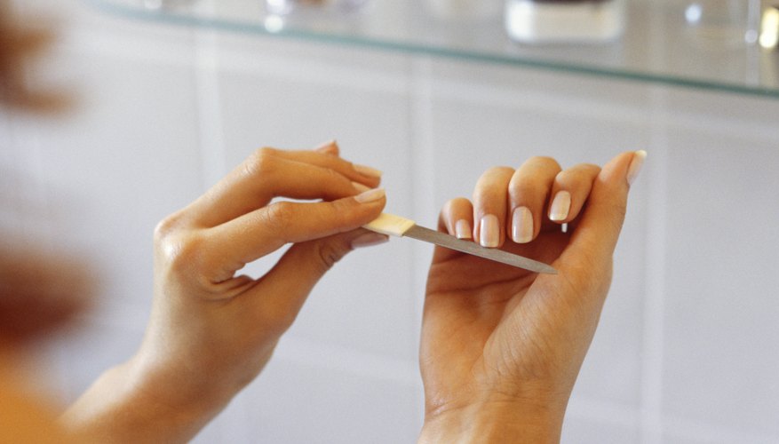 Make the silicone nails as short as possible before attempting to remove them.