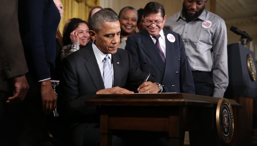 President Obama signing an executive order