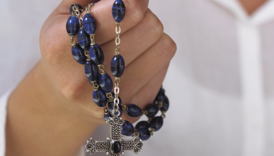 A Catholic funeral rosary is a sequence of prayers counted on rosary beads.